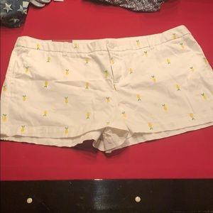 white shorts with lemons on them